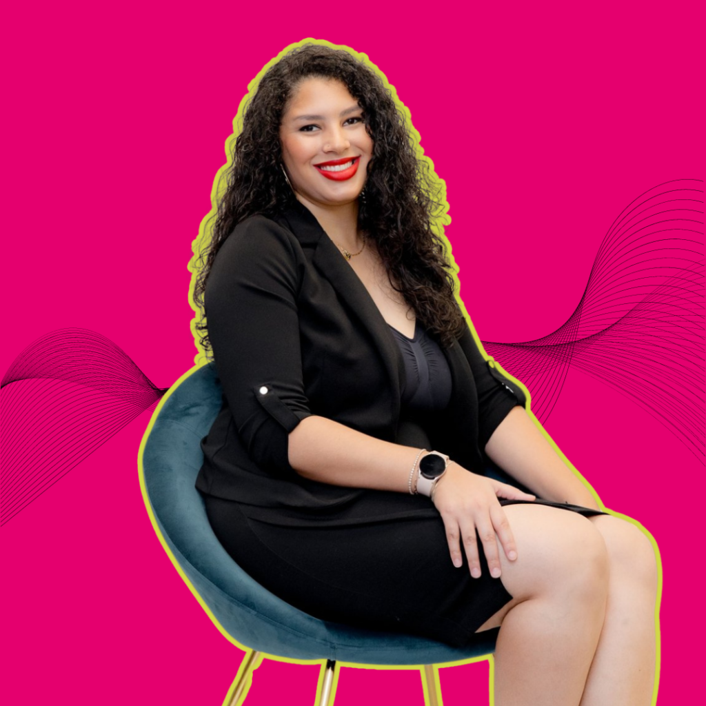 Speaker Heidy De La Cruz in a black suit sitting in a teal chair outlined in lime green against a hot pink background with an abstract soundwave in black